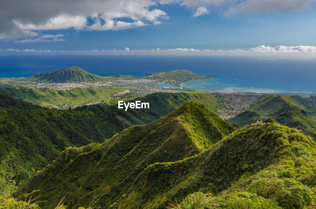 High angle view of hawaii mountain landscape with ocean view from hiking trail 