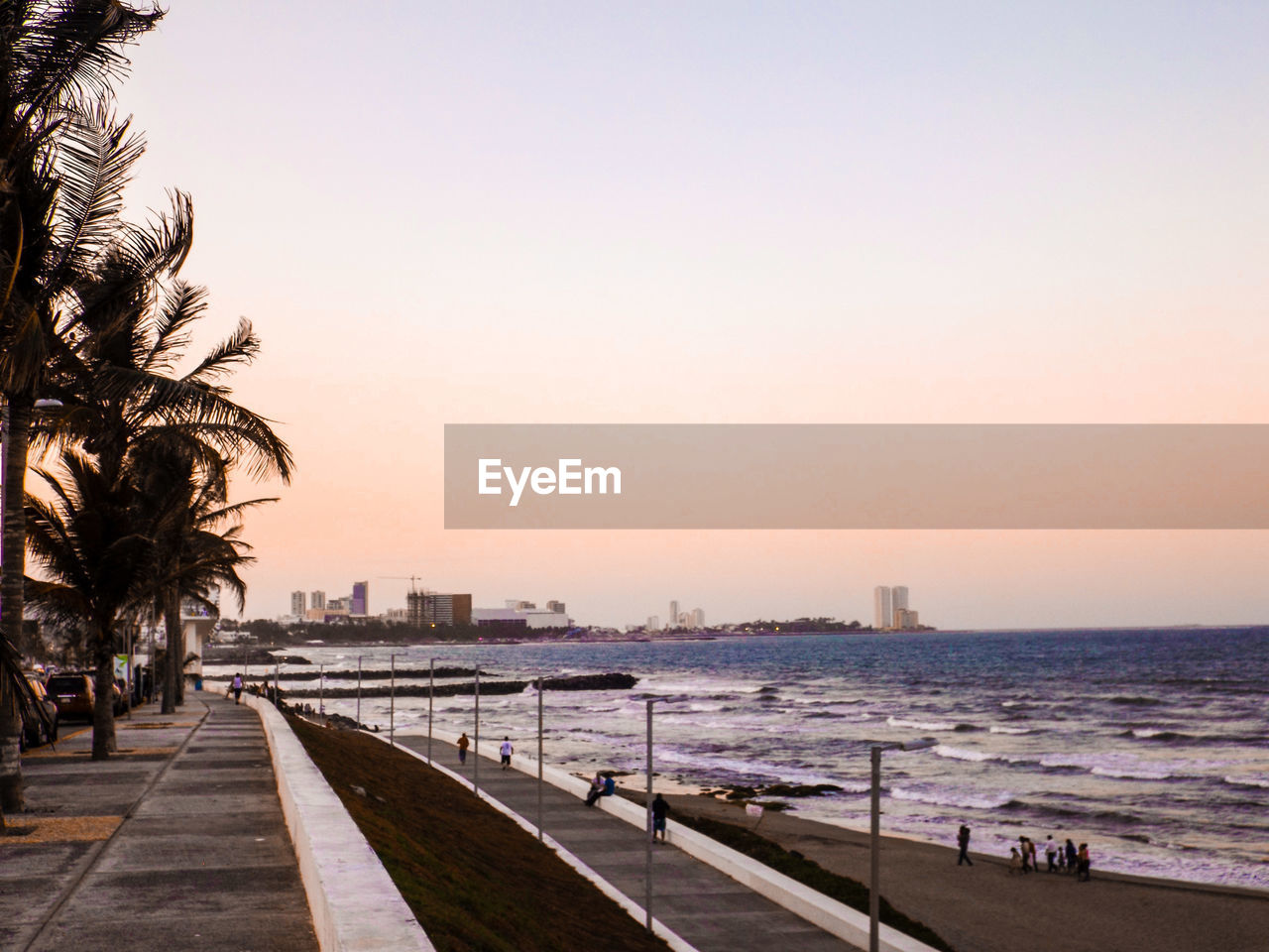 Scenic view of beach against clear sky