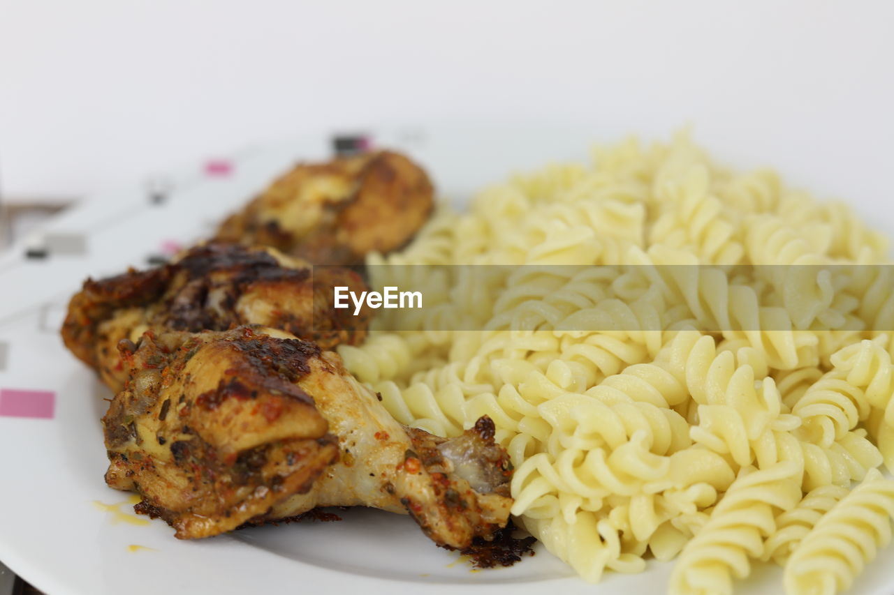 food, food and drink, freshness, dish, cuisine, plate, healthy eating, wellbeing, indoors, meat, no people, fried food, close-up, produce, meal, italian food, vegetable, chicken meat, chicken, pasta