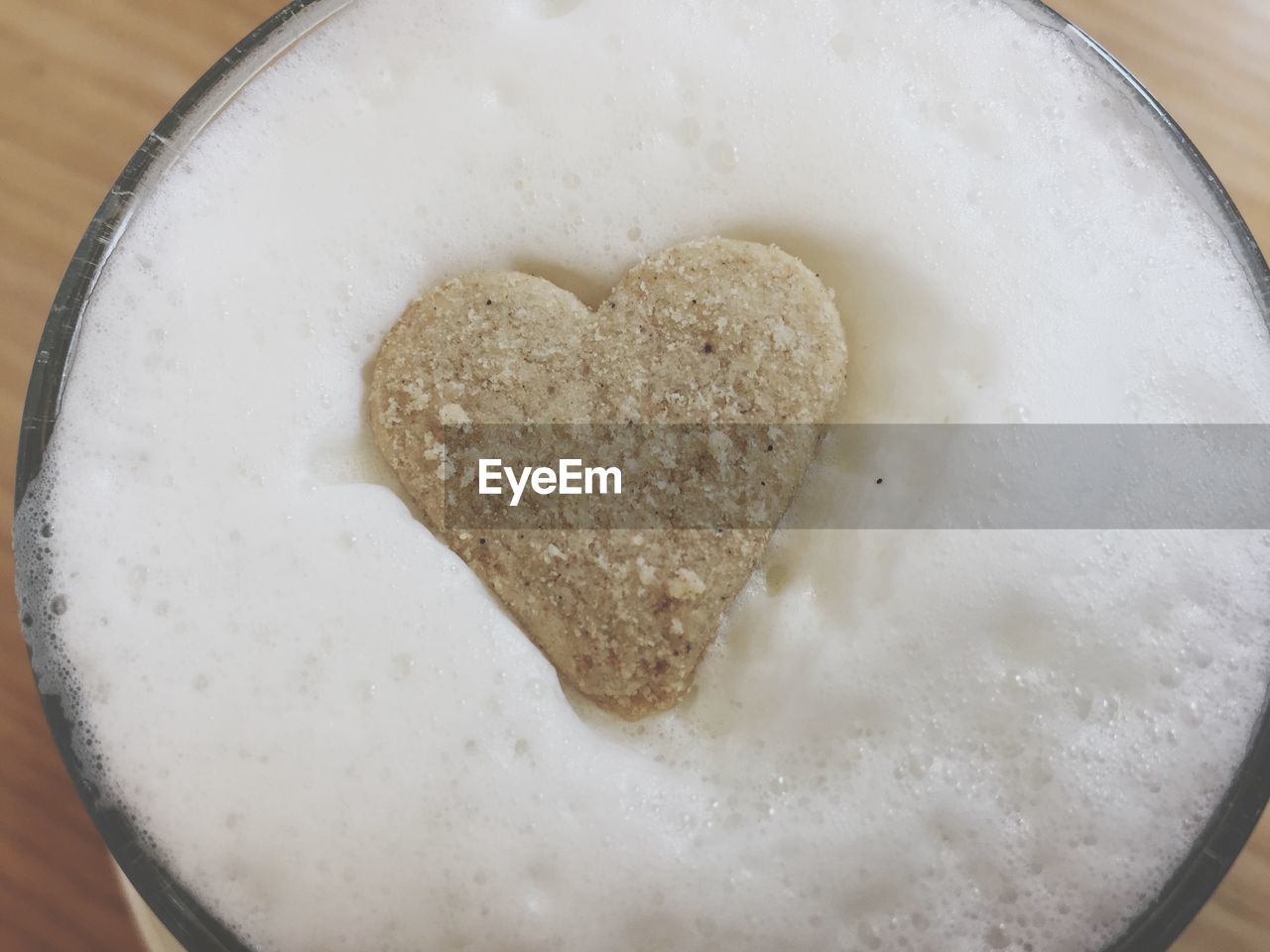 HIGH ANGLE VIEW OF HEART SHAPE BREAD IN GLASS