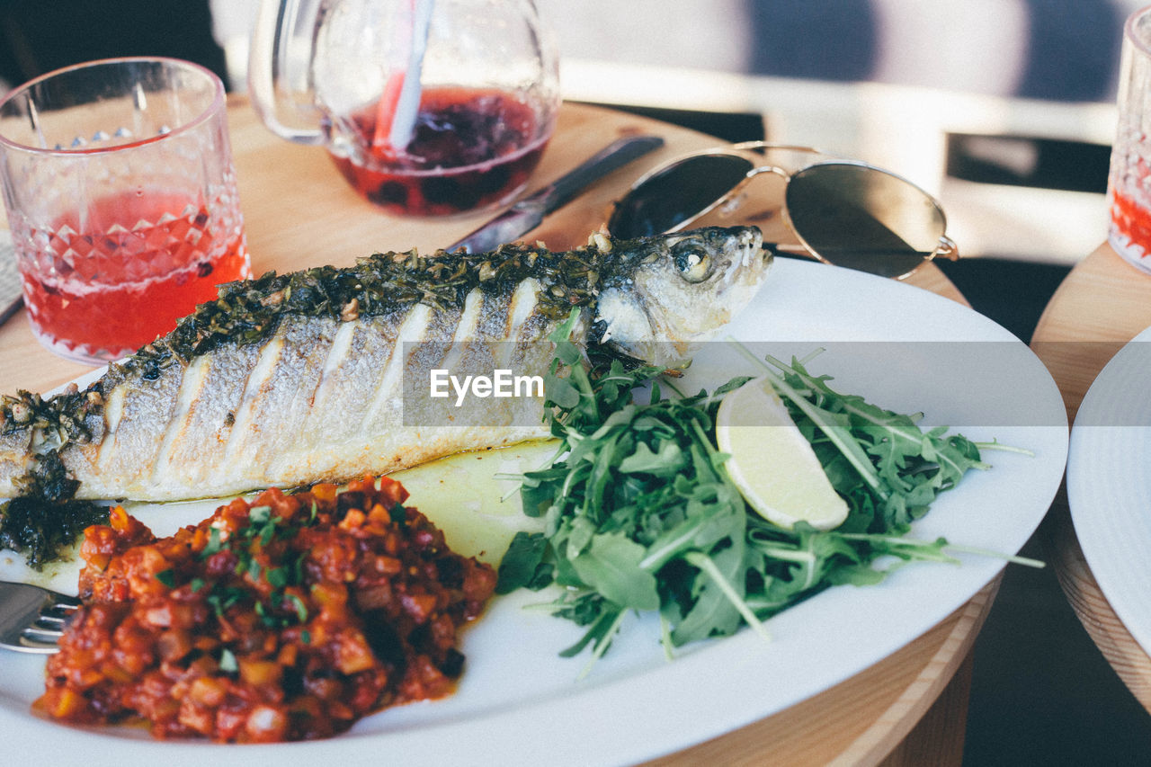 Close-up of fresh seafood served on table at restaurant