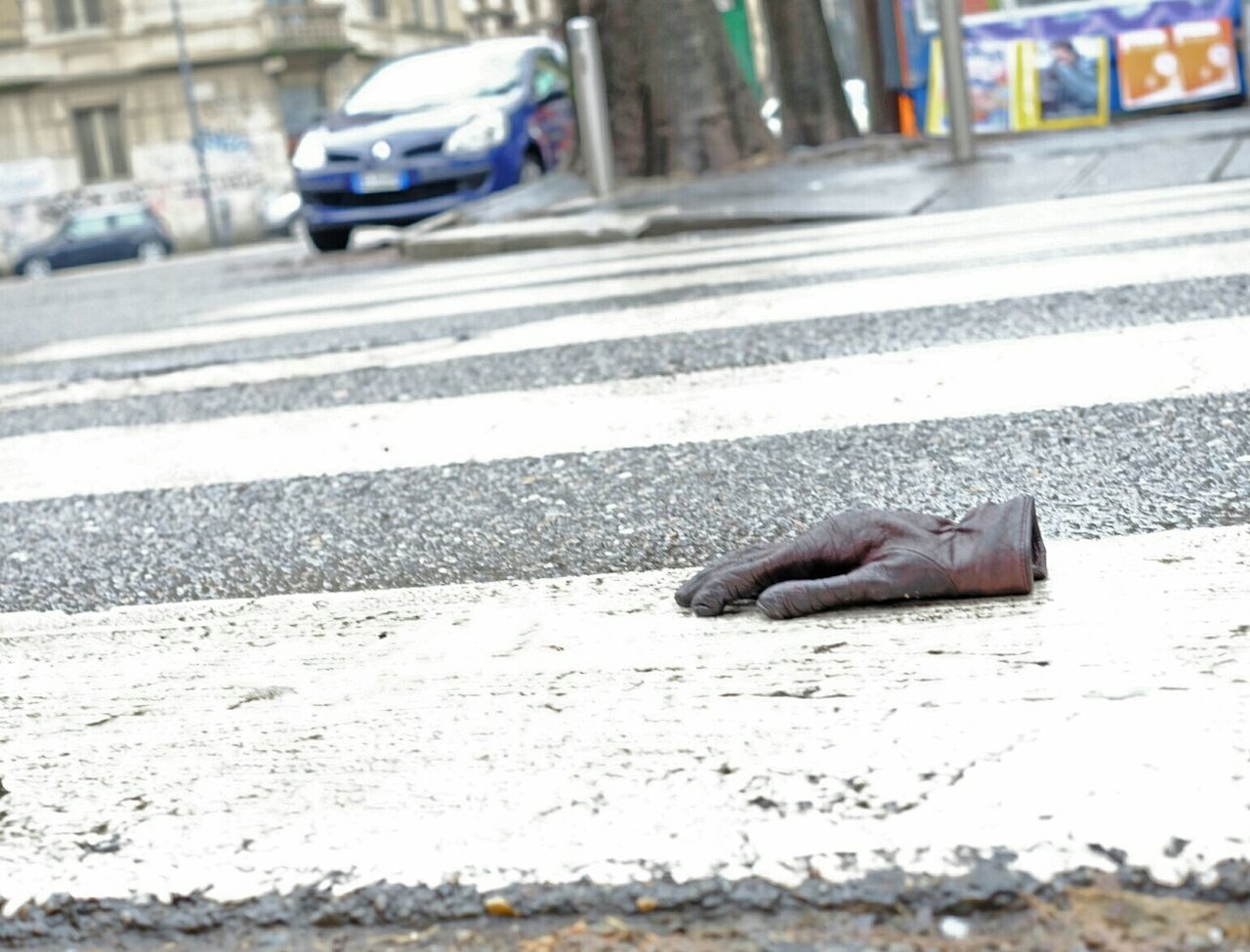 Leather glove on road