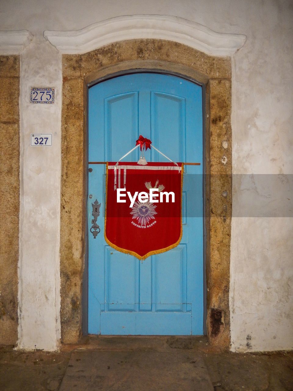 RED CLOSED DOOR OF BLUE WINDOW