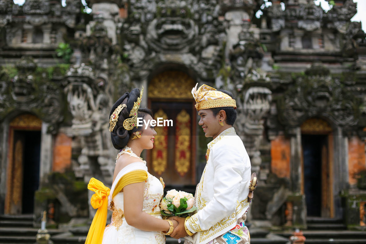 Wedding couple in balinese traditional clothes