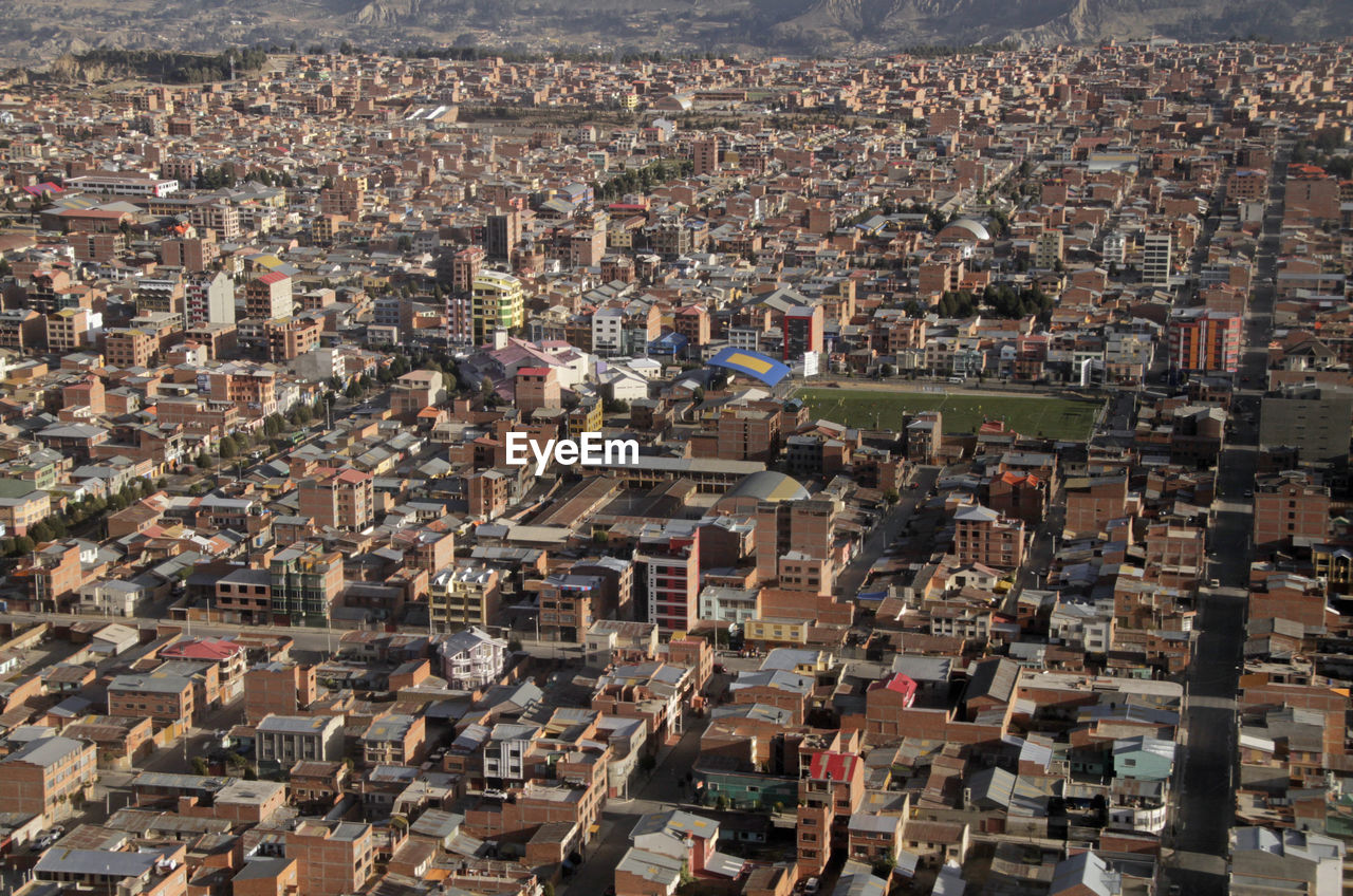 HIGH ANGLE VIEW OF CITYSCAPE