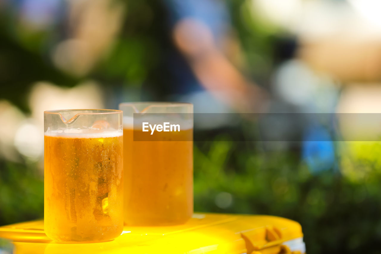 CLOSE-UP OF DRINK ON TABLE