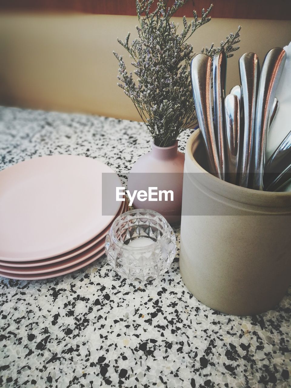 High angle view of kitchen utensils on marble