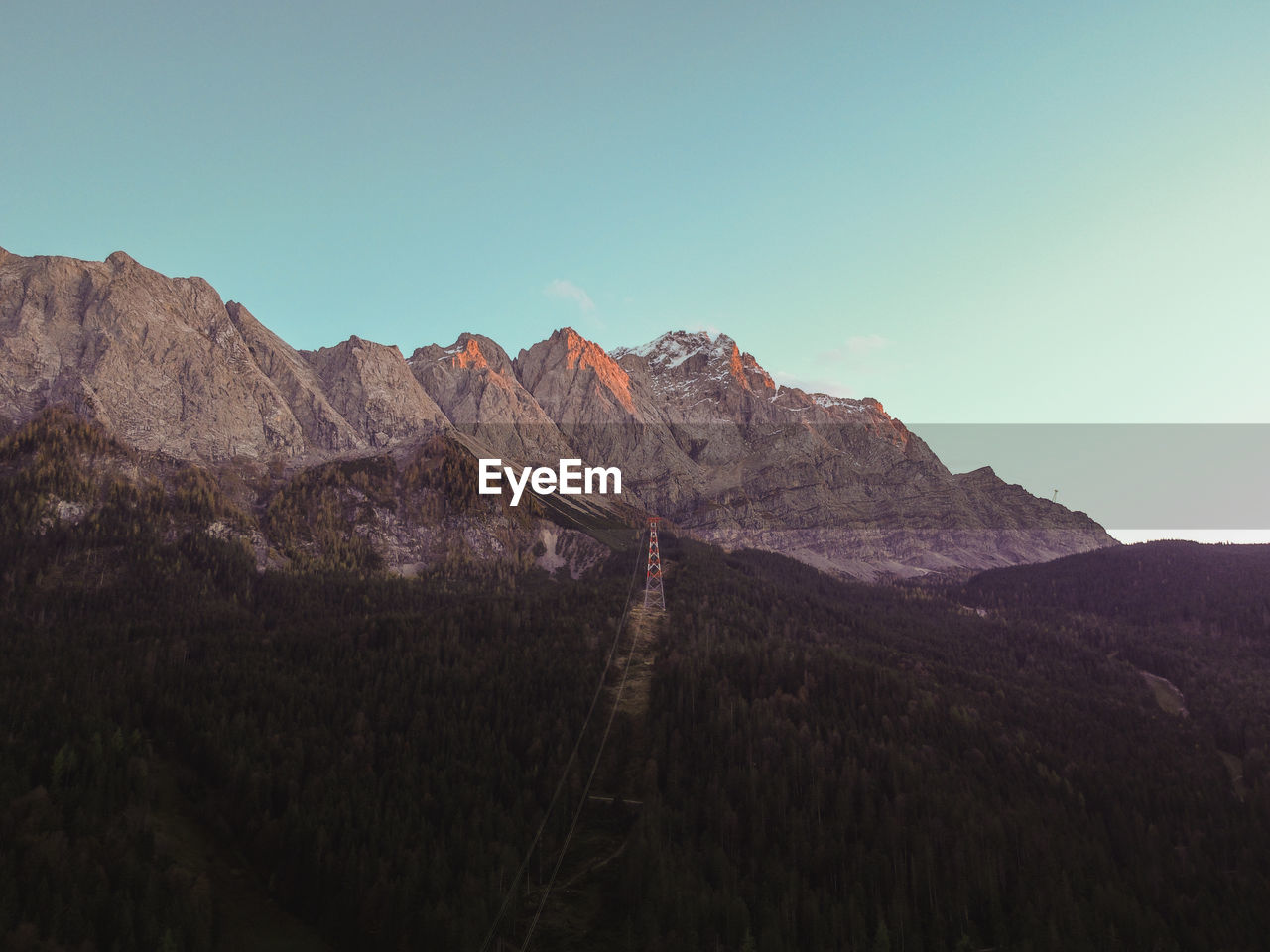 Colorful landscape with mountais and lake at golden hour