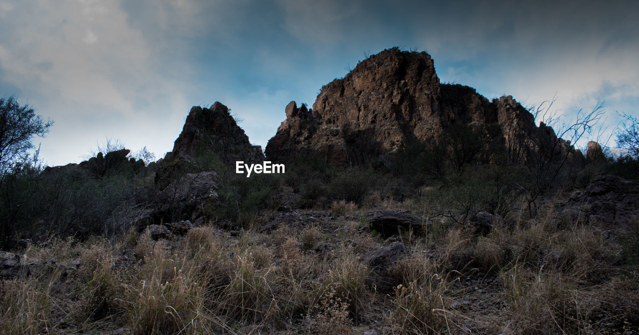 Panoramic view of rocky mountains against sky