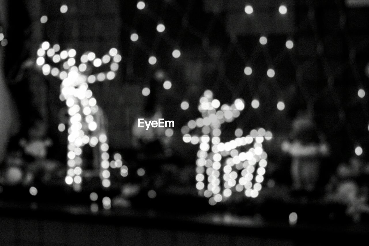 Defocused image of illuminated christmas decoration