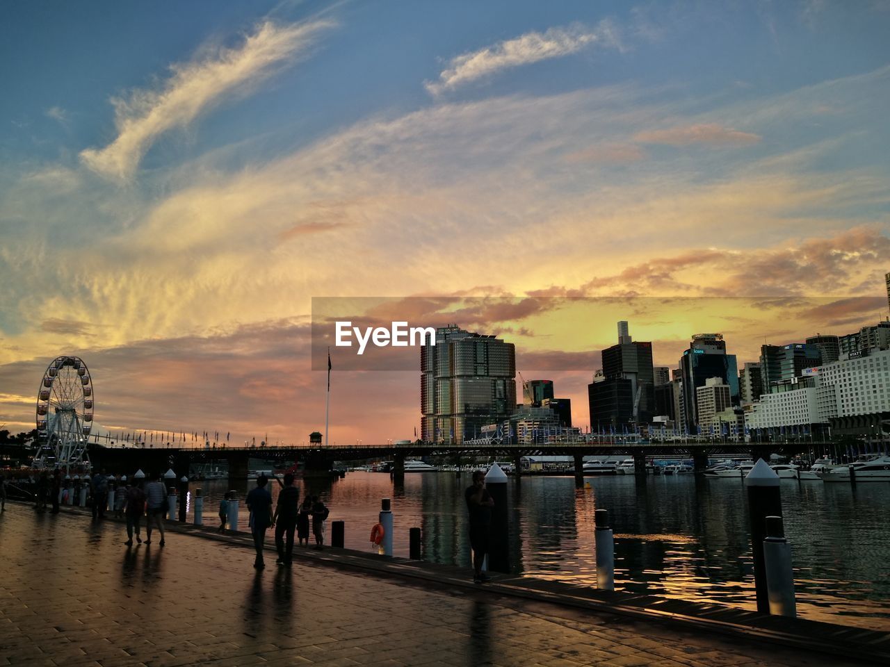 Scenic view of river against sky during sunset