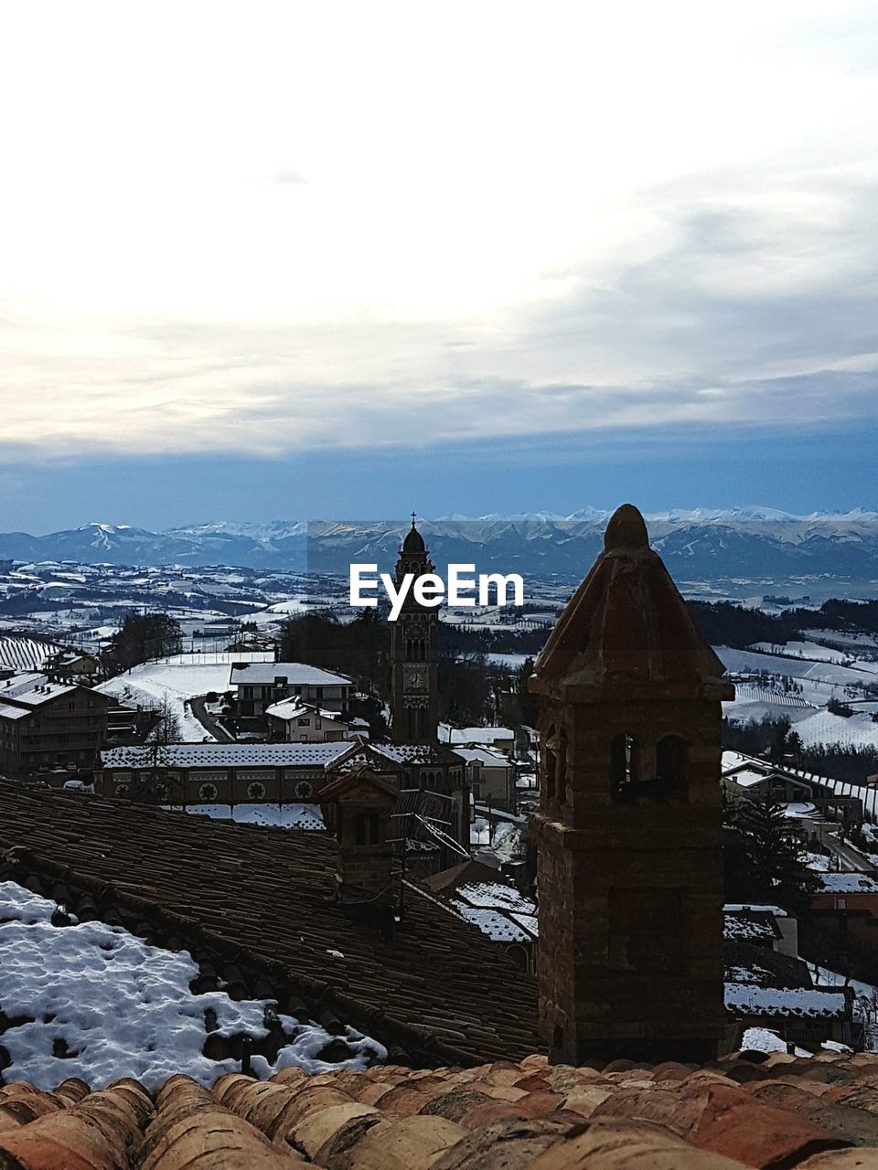 Scenic view of snow covered landscape against sky