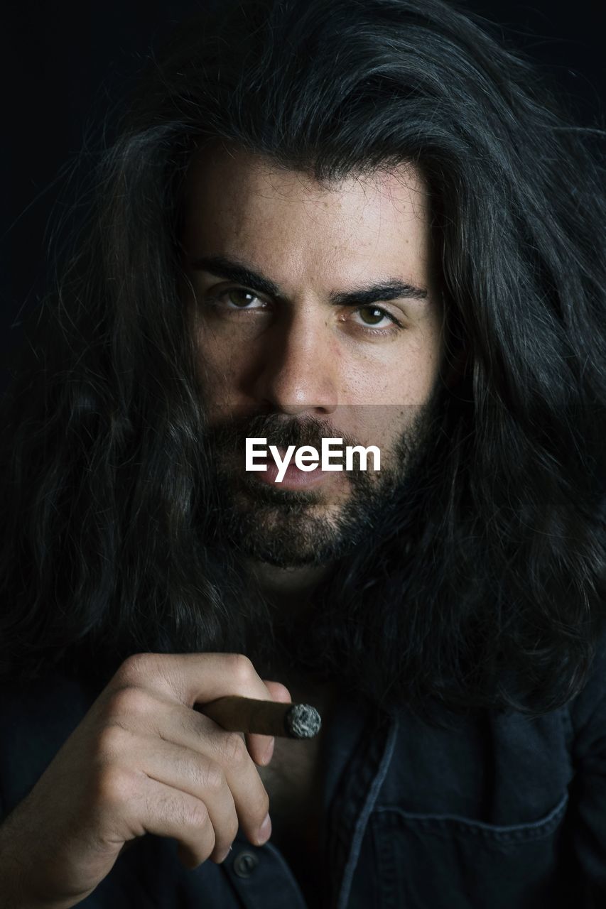 Close-up portrait of bearded man