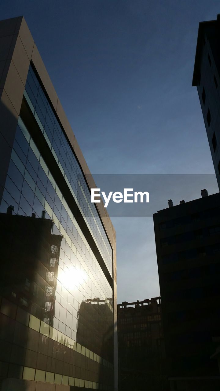 Low angle view of modern building against sky