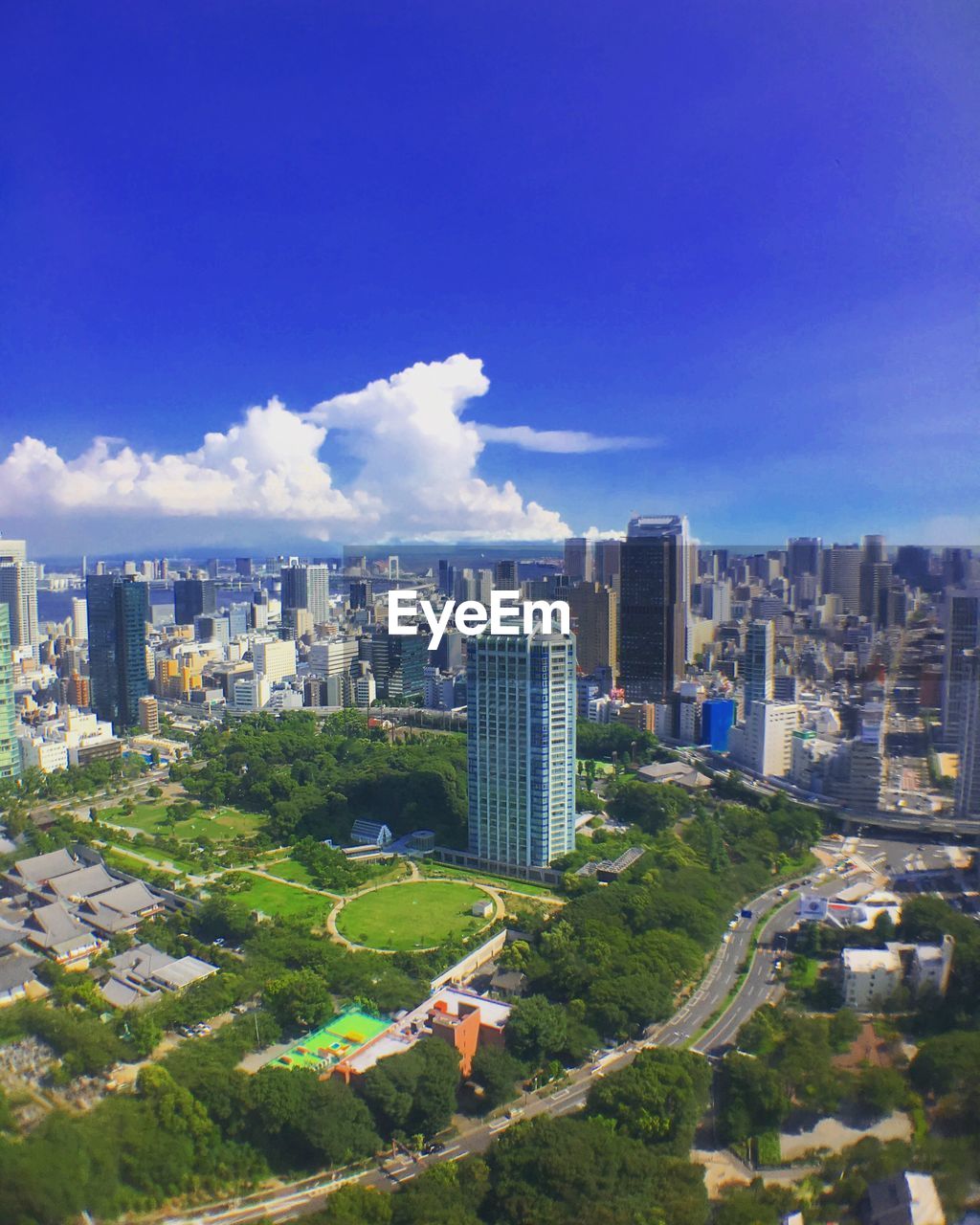 CITYSCAPE AGAINST BLUE SKY