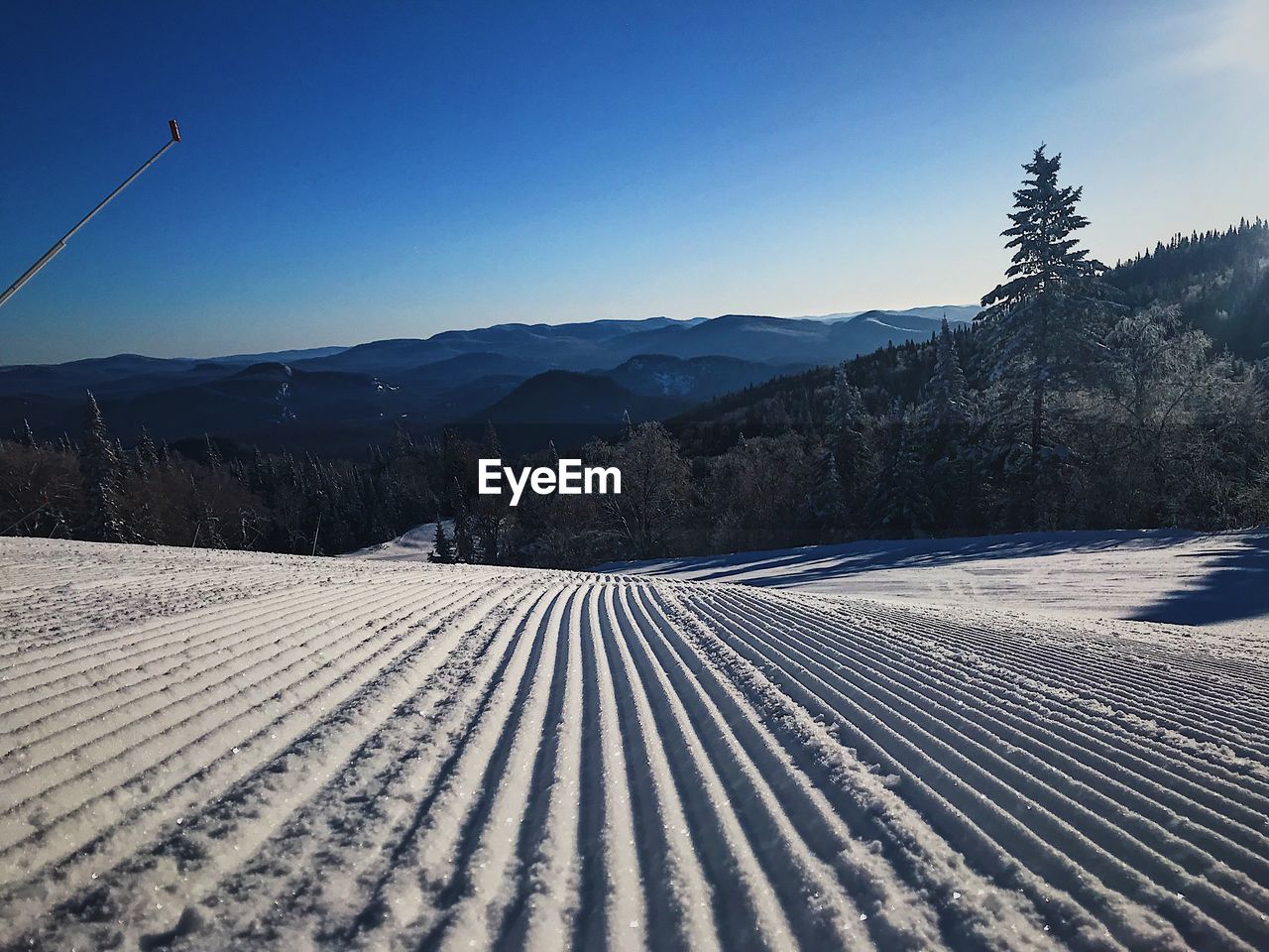 View of snow field against sky