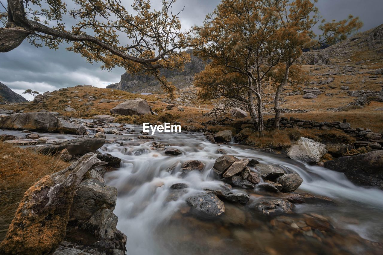 Scenic view of stream against sky