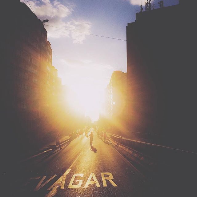 ROAD PASSING THROUGH CITY AT SUNSET