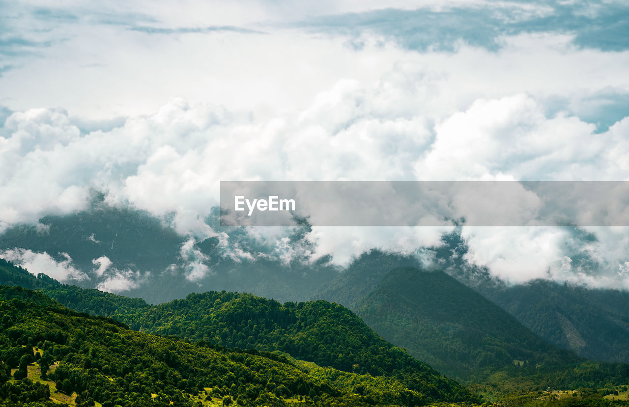 Summer landscape with mountain and clouds