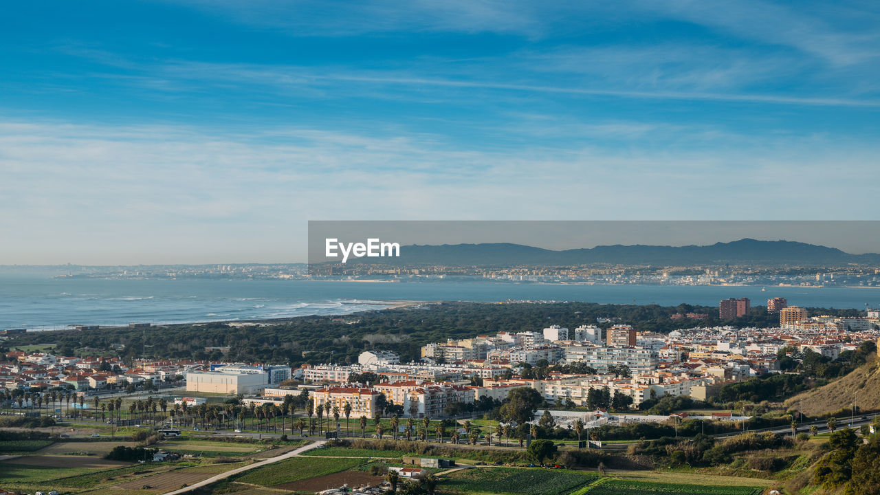 High perspective view of greater lisbon from miradouro aldeia dos capuchos in costa de caparica