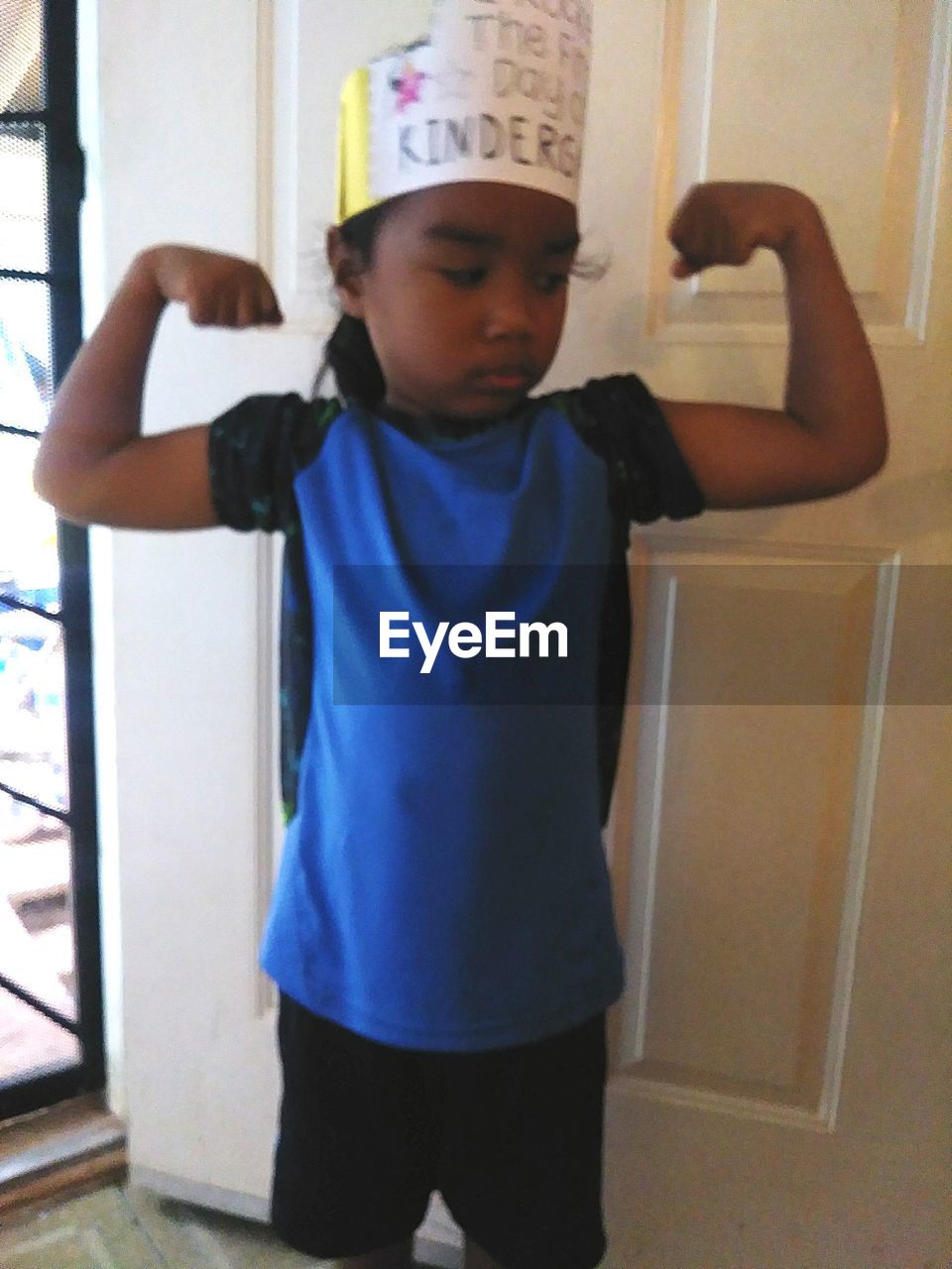 BOY LOOKING AT CAMERA