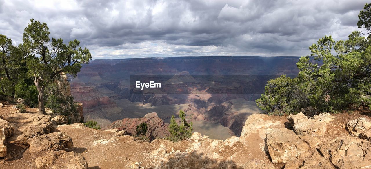 SCENIC VIEW OF ROCKY MOUNTAINS AGAINST SKY