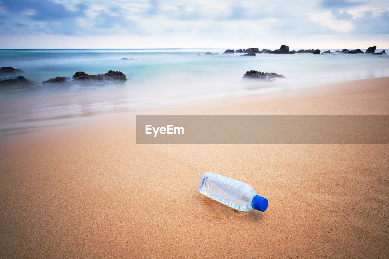 Plastic bottle on the beach.