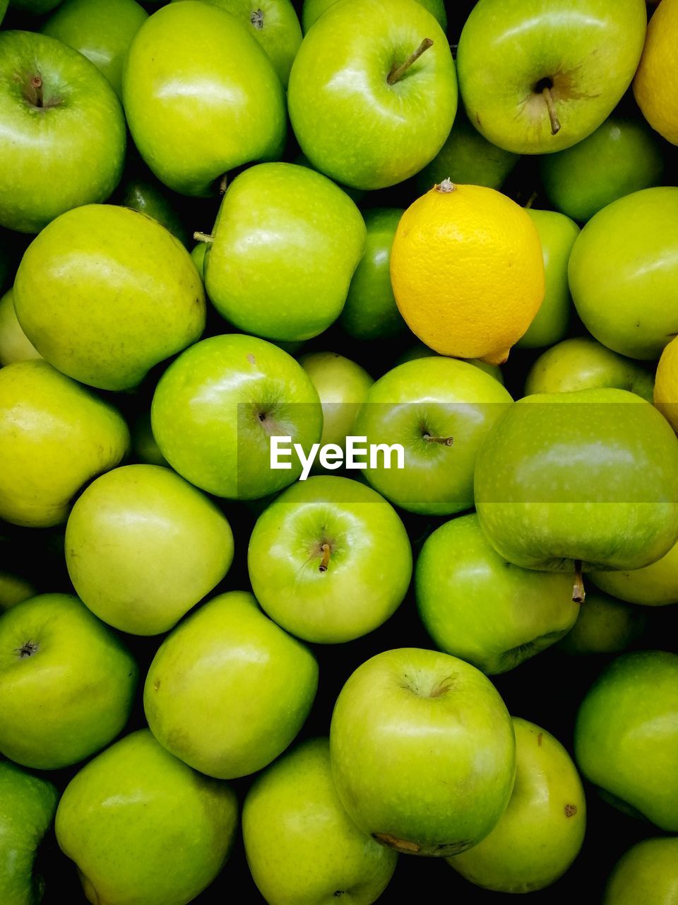 Full frame shot of granny smith apples