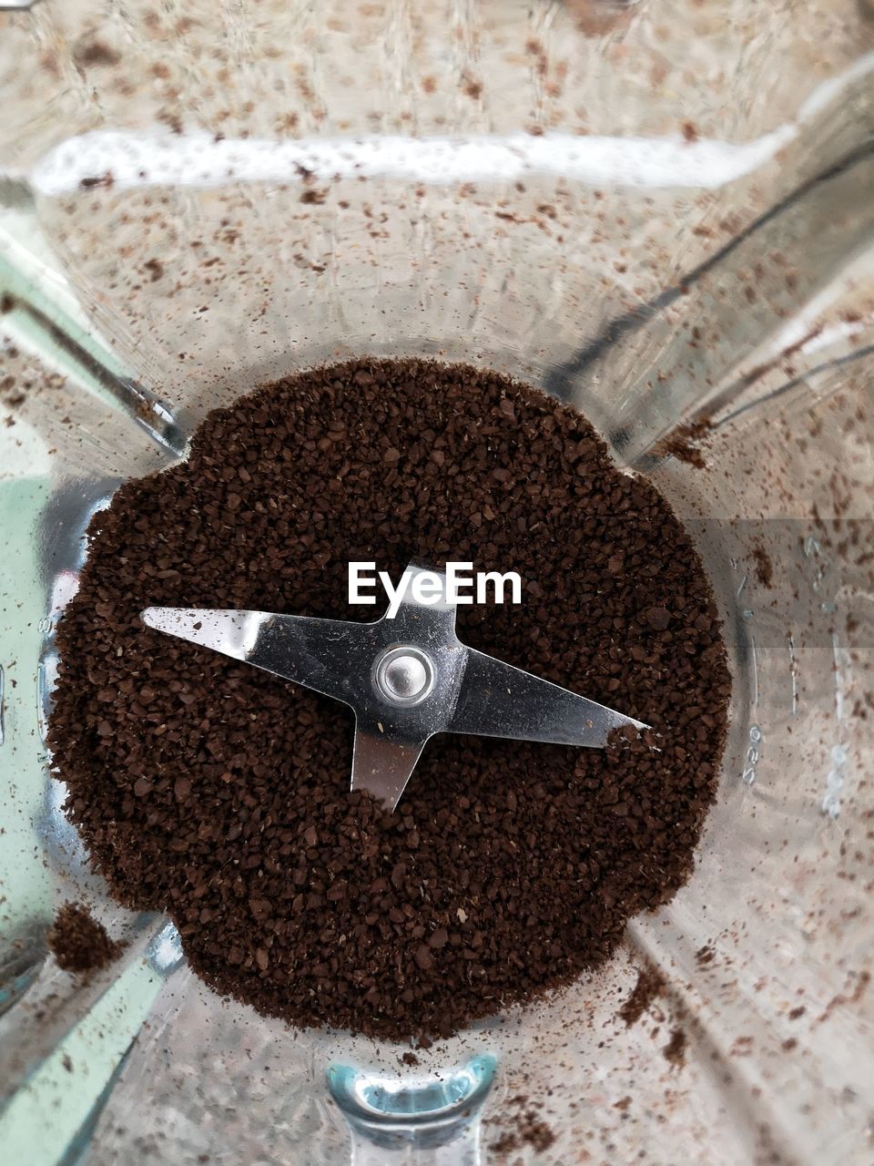 Coffee beans in grinder