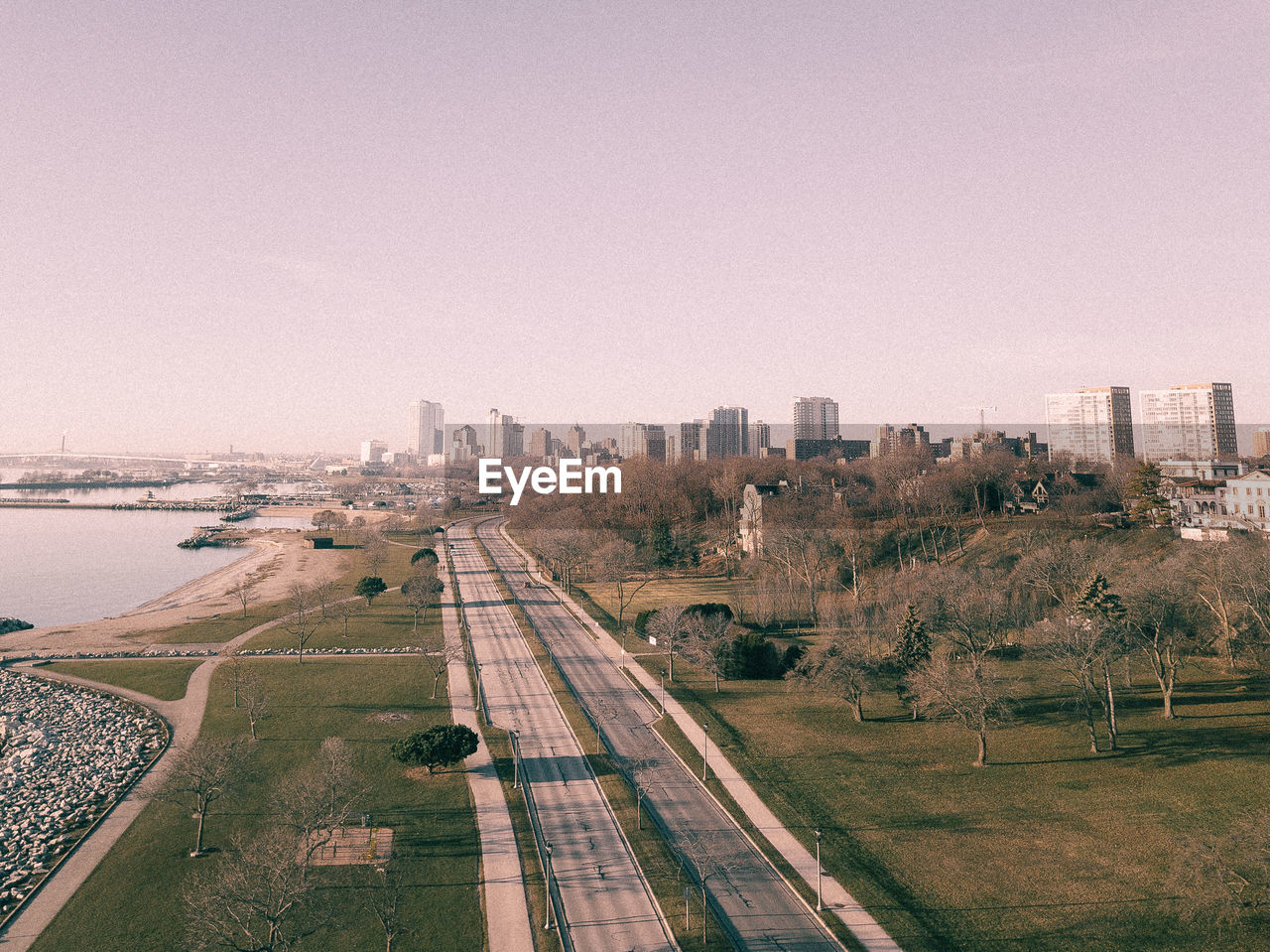 Aerial view of city against clear sky