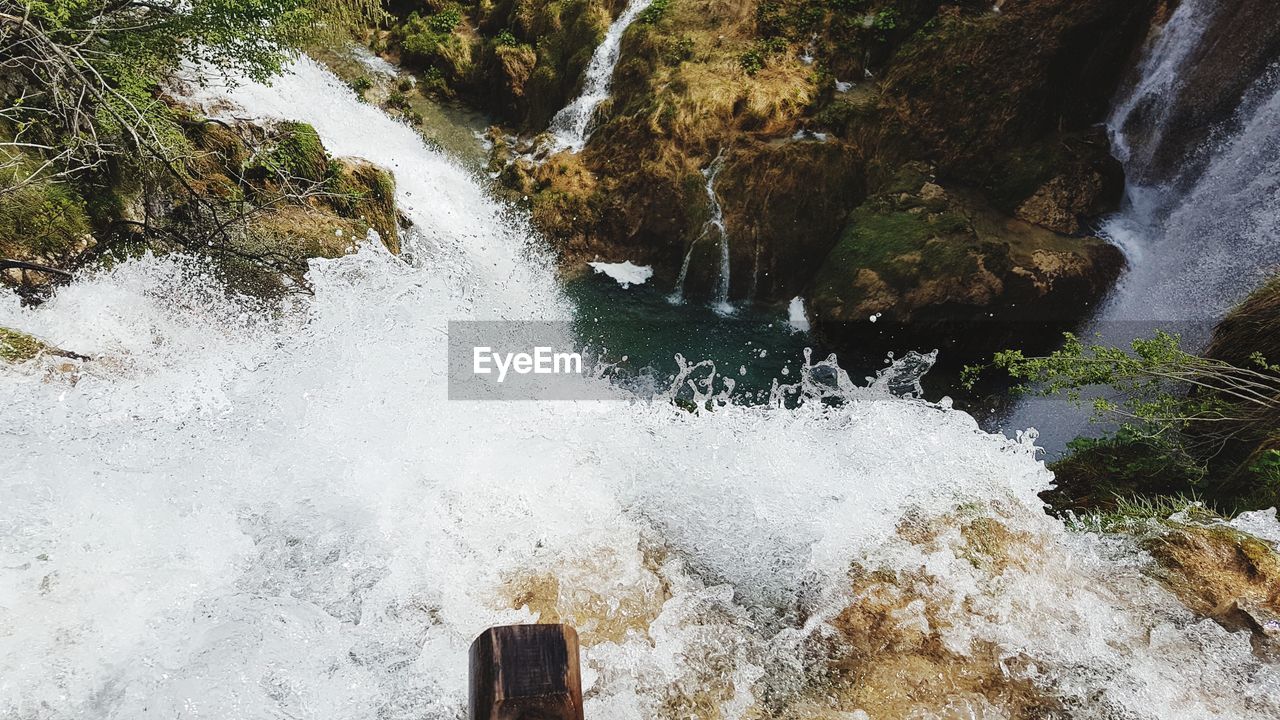 WATER SPLASHING ON ROCK