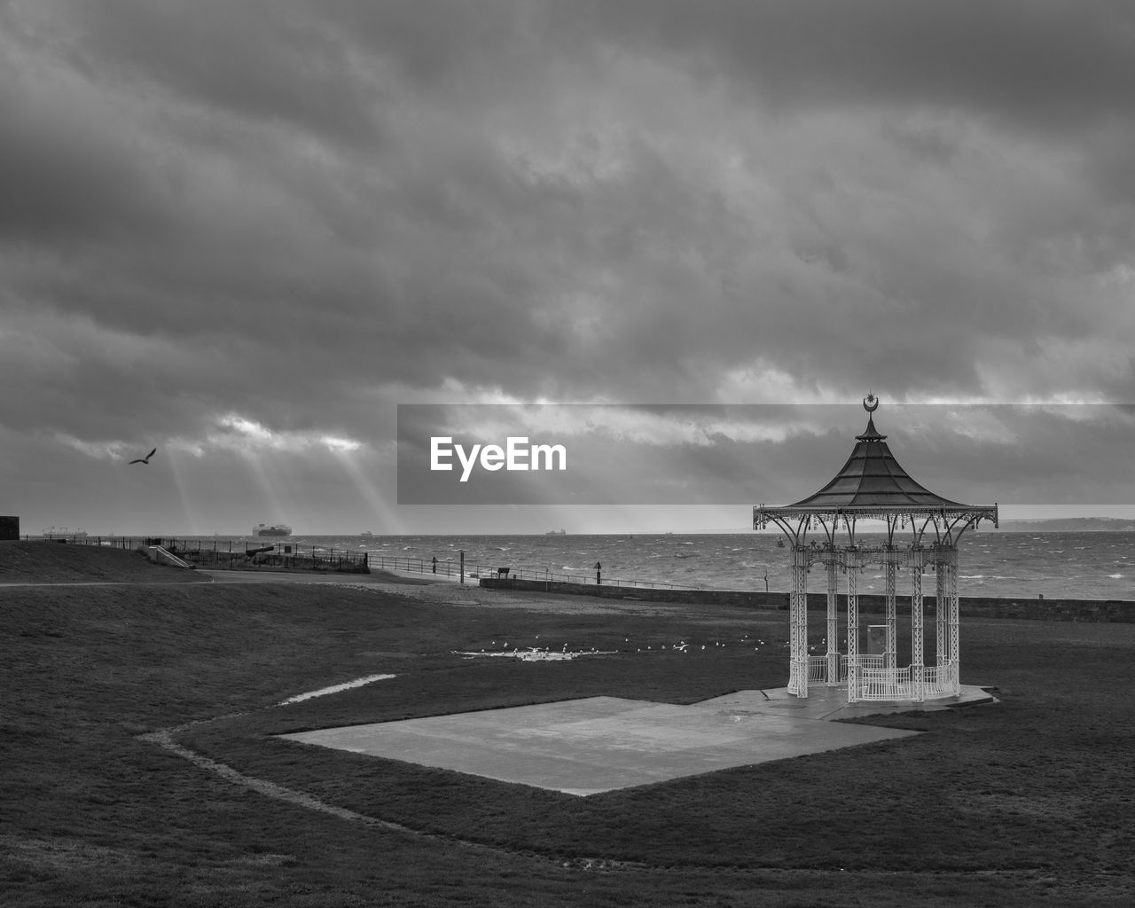 Light rays over the bandstand at southsea in black and white 