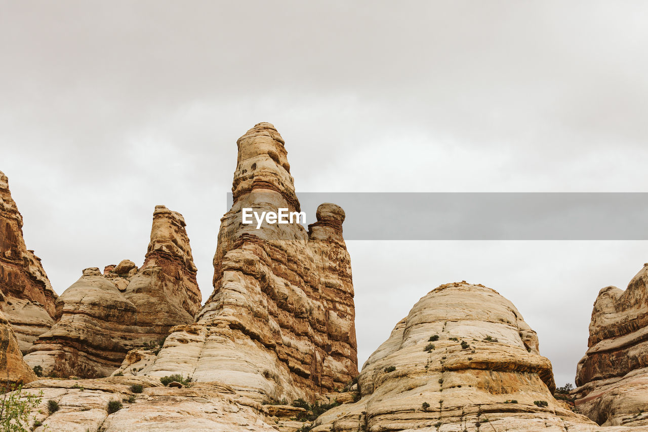 The fins dominate the gray skyline of the maze in utah