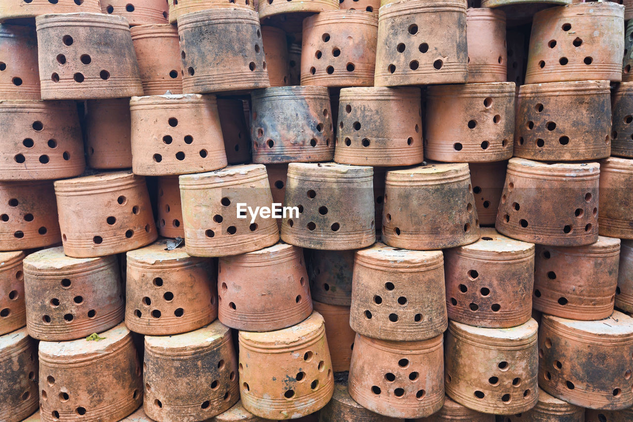 Full frame shot of stacked earthenware