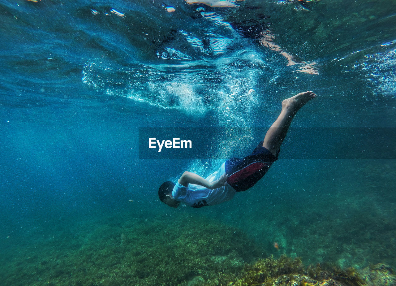 Man swimming in sea