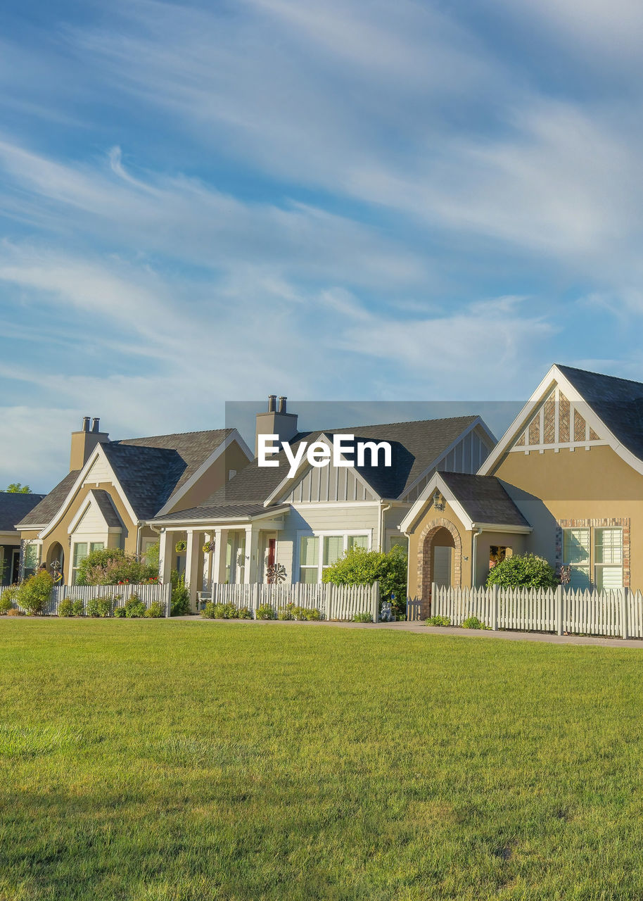 view of house on field against sky