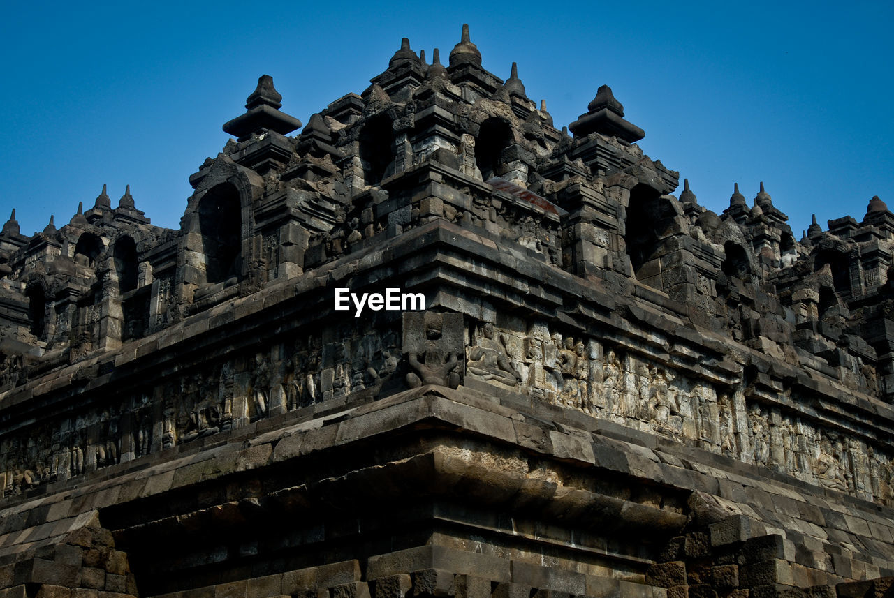 LOW ANGLE VIEW OF TEMPLE AGAINST SKY