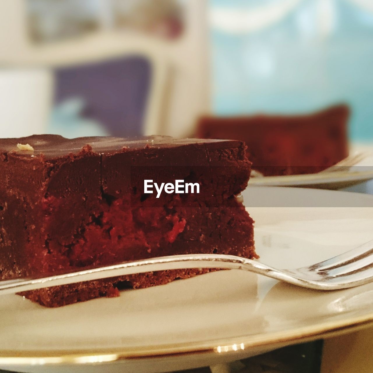 Close-up of brownie served with fork in plate