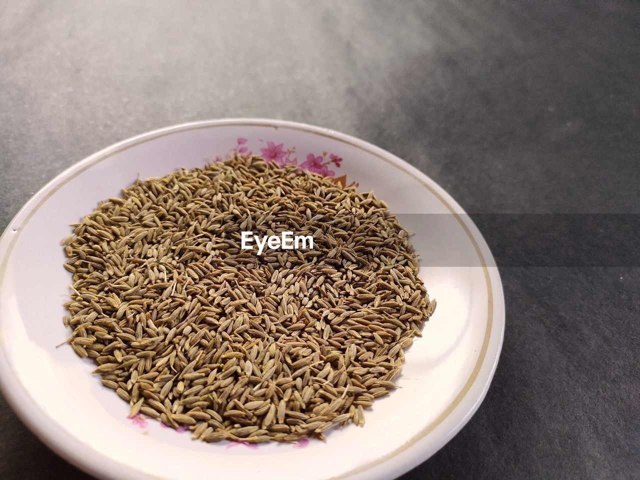 Cumin seed in a plate, an essential ingredient for tasty and delicious food.