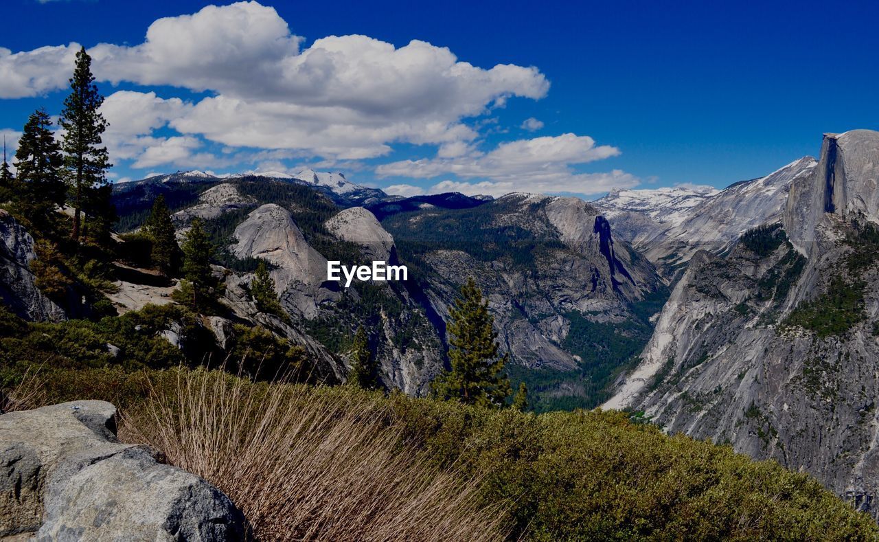 Panoramic view of landscape and mountains against sky