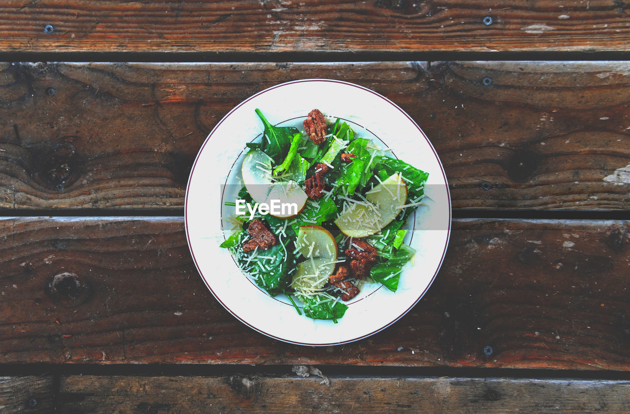 Directly above shot of salad served in plate on table