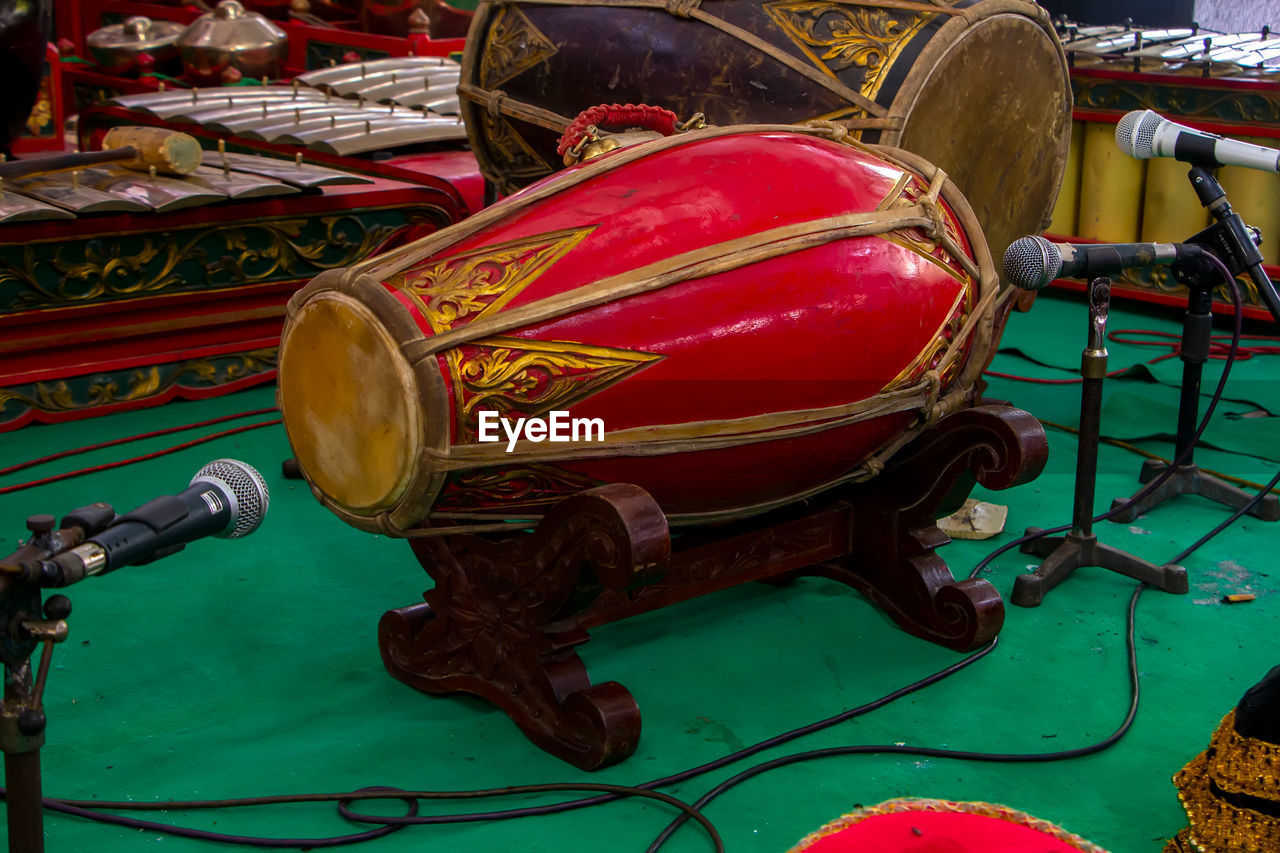 vehicle, drum, arts culture and entertainment, membranophone, no people, music, musical instrument, mode of transportation, red, drums, transportation