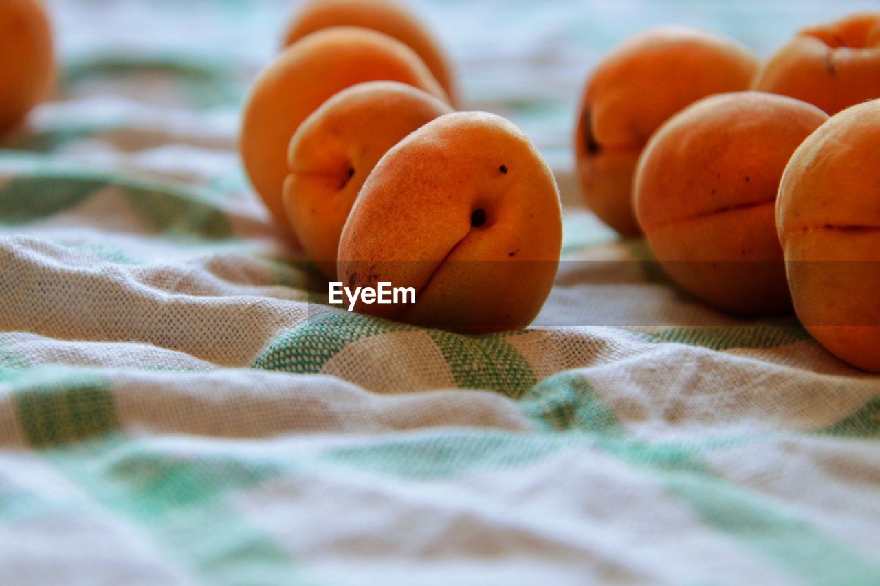 Close-up of apricot on table