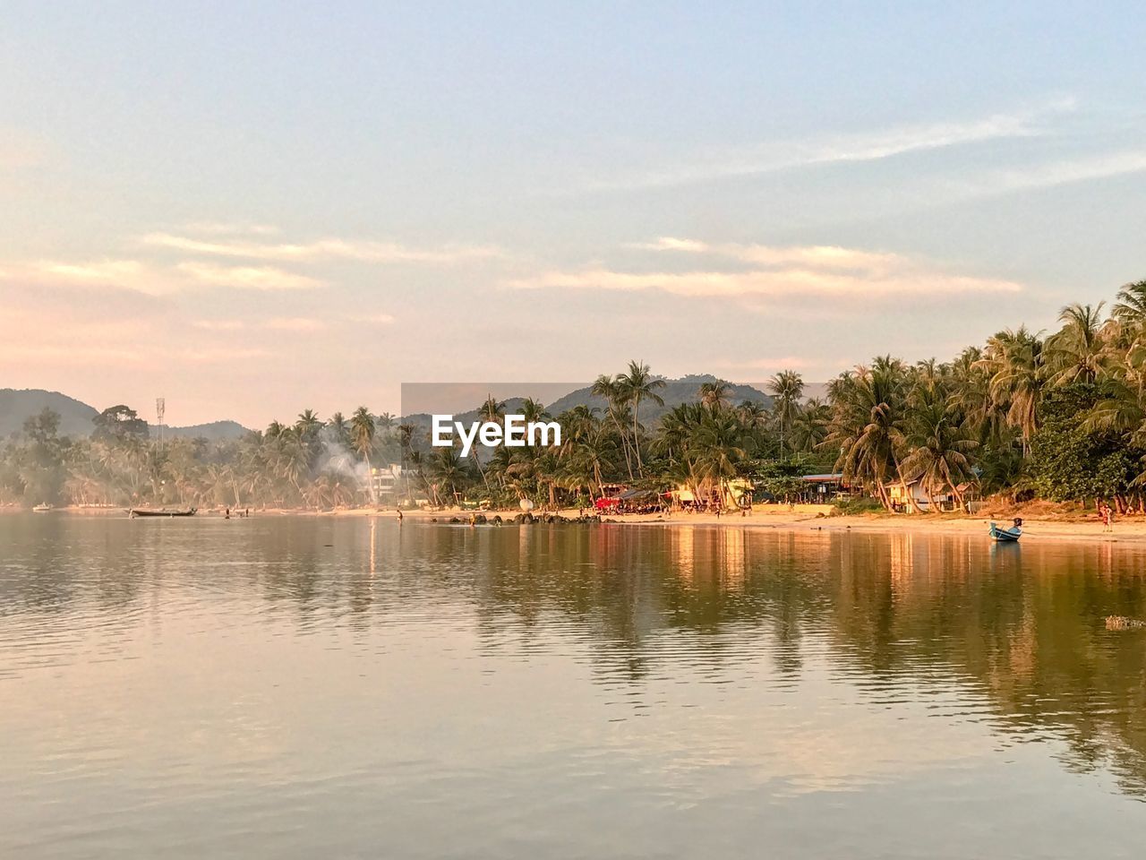 SCENIC VIEW OF LAKE WITH TREES AGAINST SKY