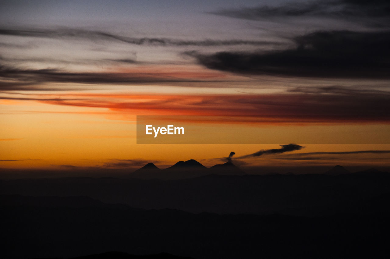 Sunrise with the look of three active volcanoes in guatemala