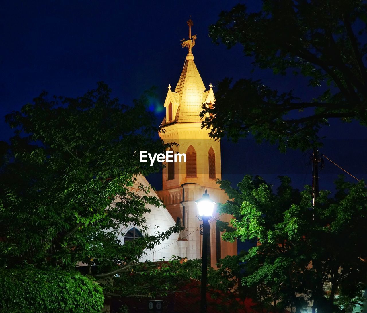 Low angle view of church against sky at night