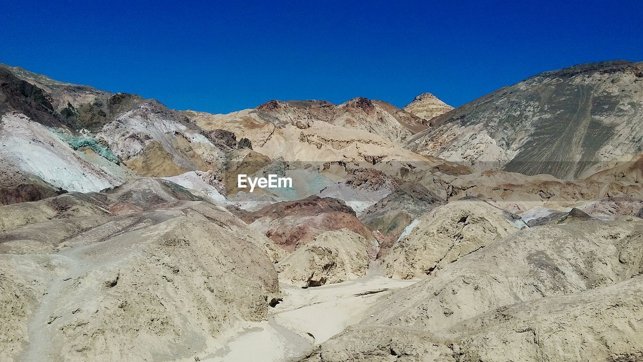 Scenic view of mountains against clear sky