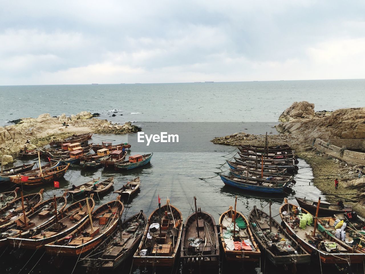 Boats moored at beach