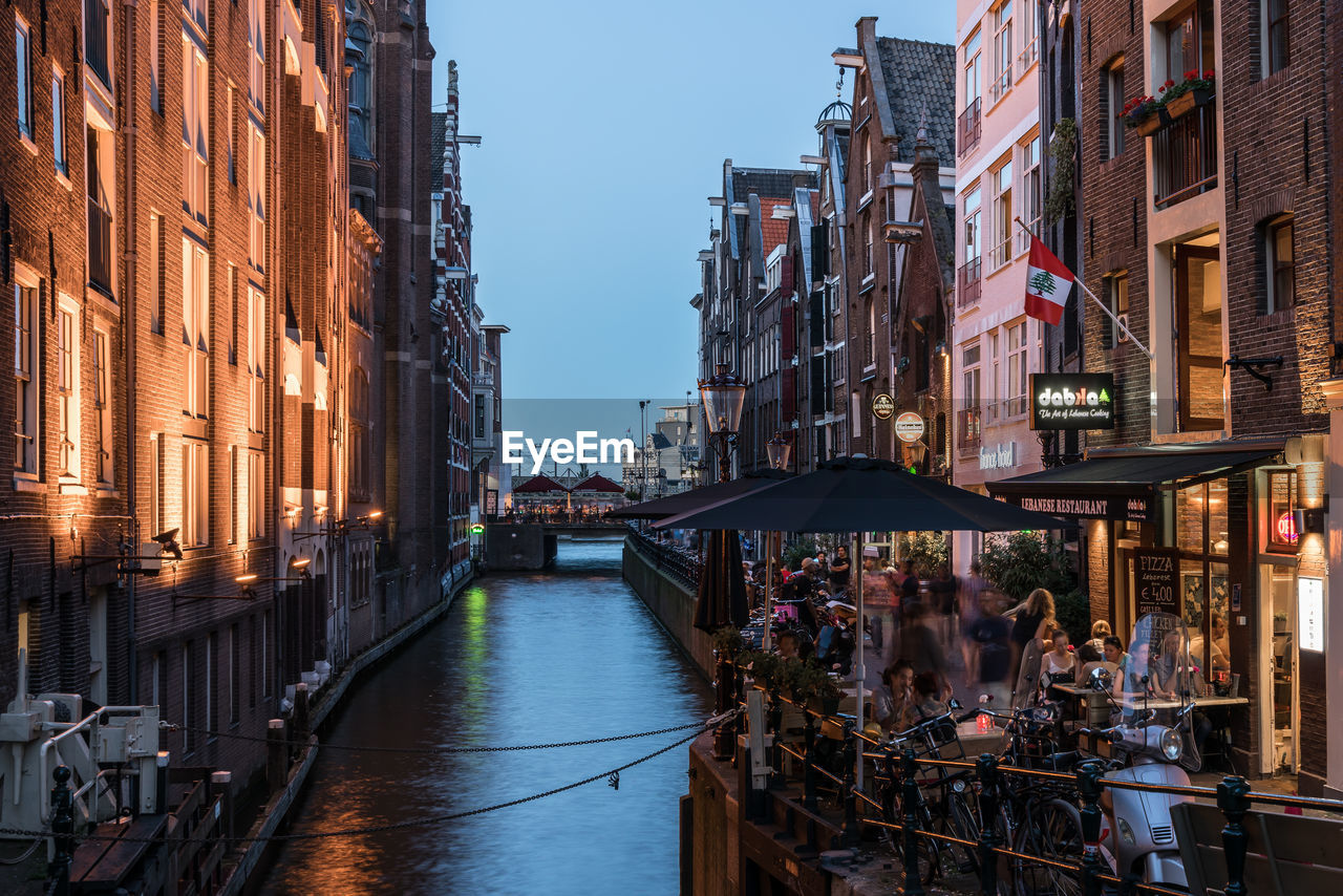 View of canal along buildings