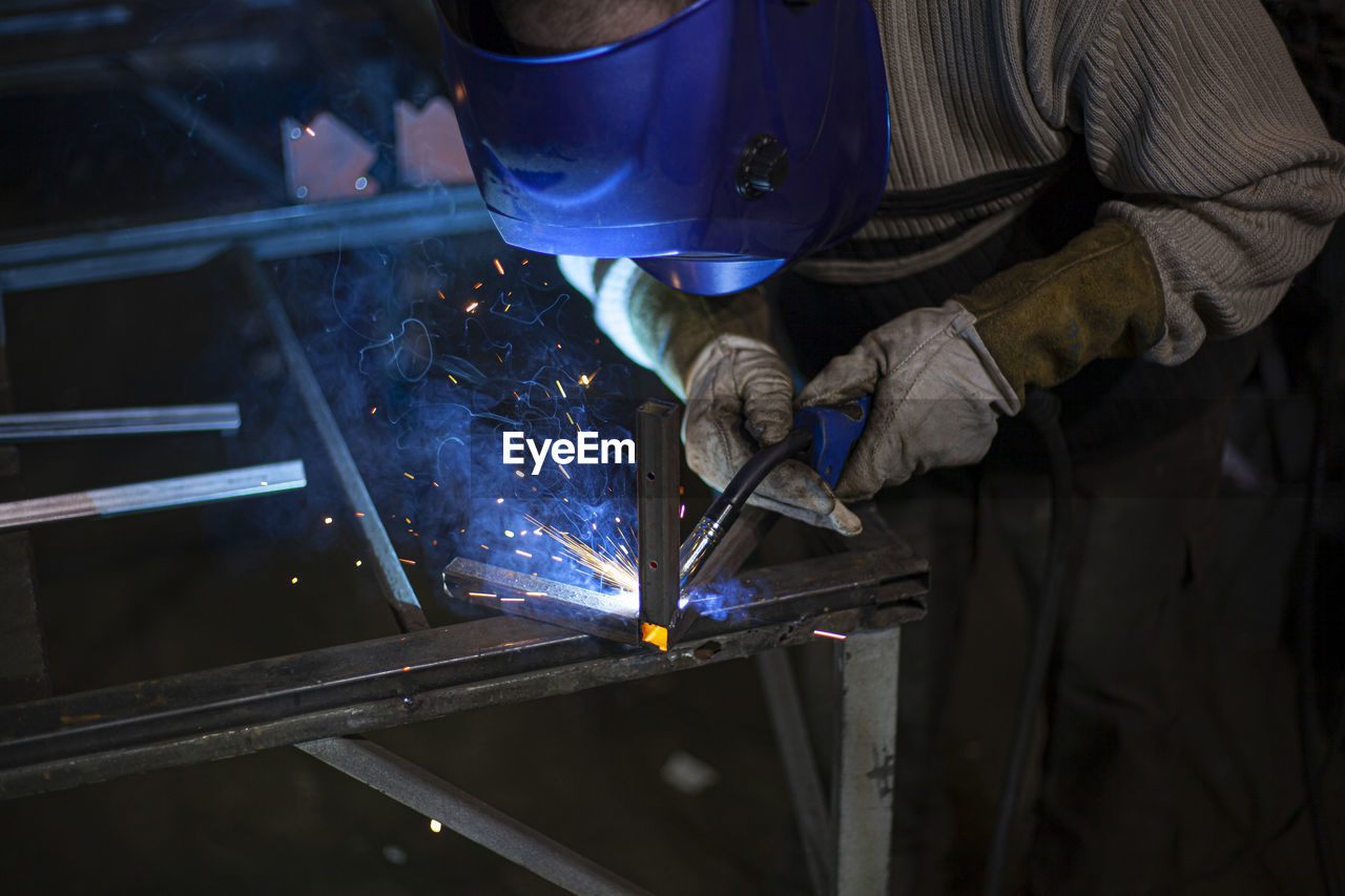 Man working on metal